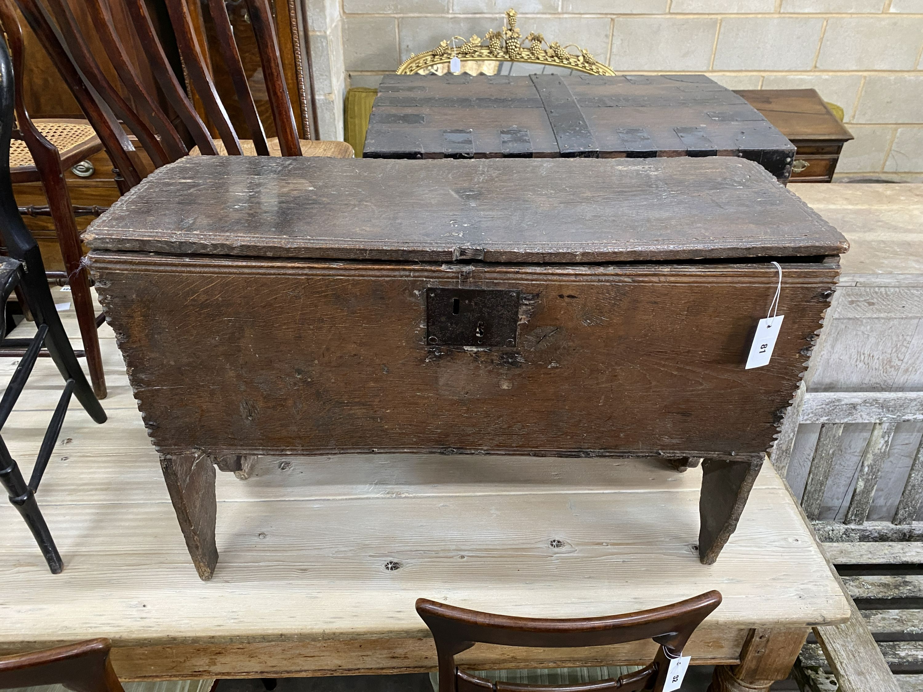 A 17th century oak six plank coffer, length 88cm, depth 33cm, height 60cm